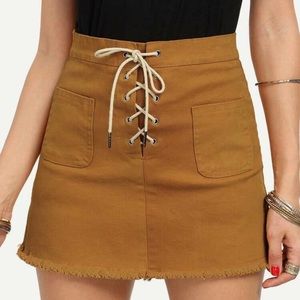 Lace Up Fly Dual Pocket Raw Hem Skirt